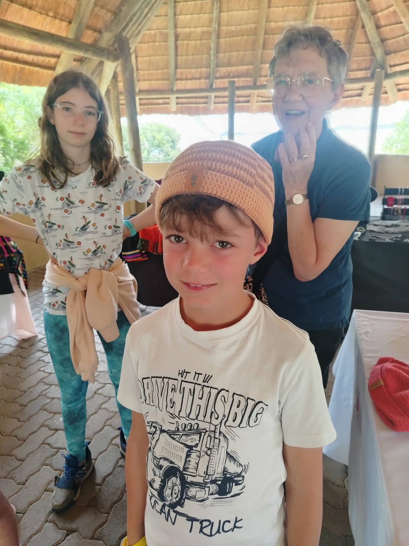 International visitors wearing Thabonaka beanies