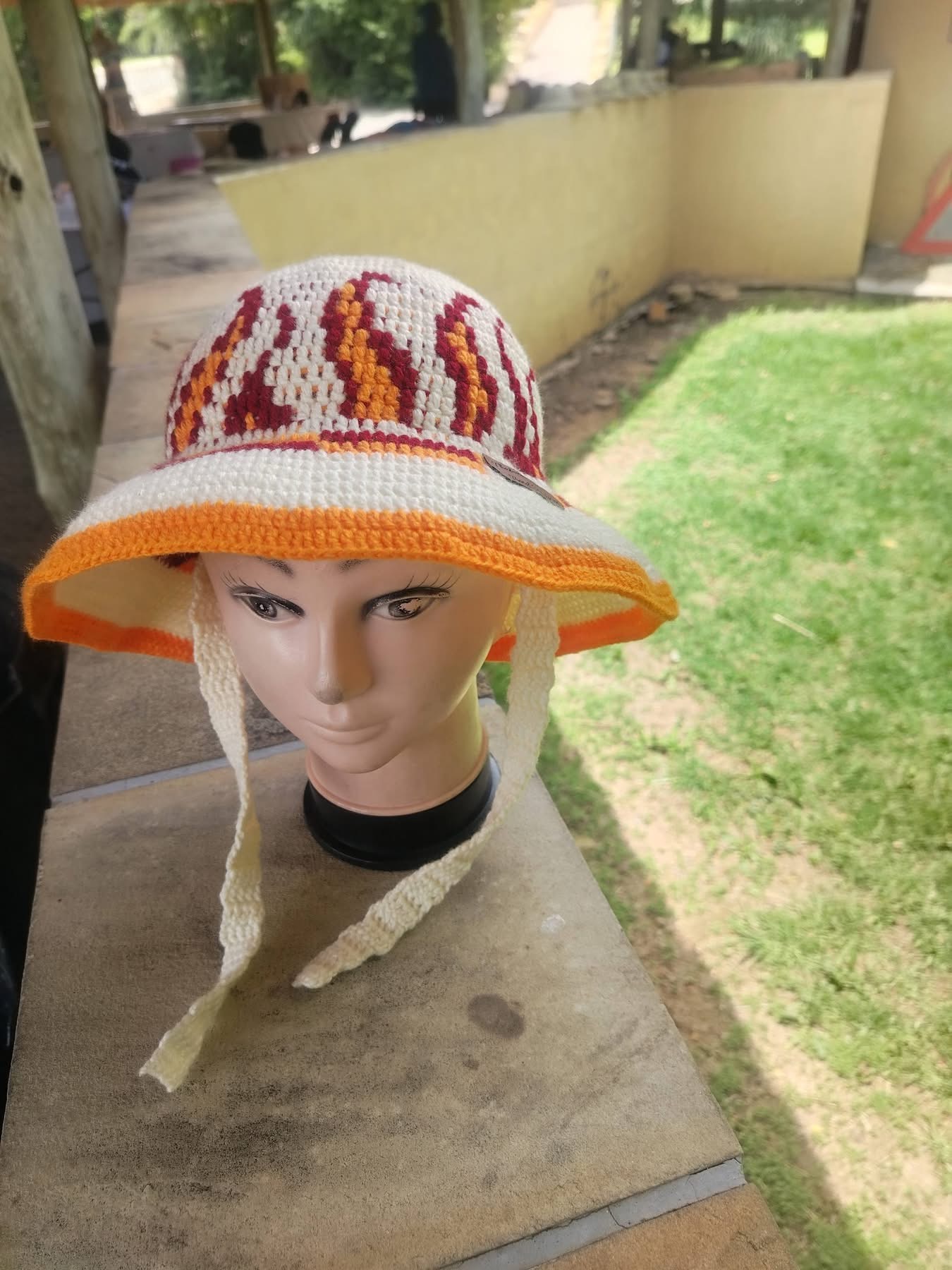 Signature flame-pattern Thabonaka bucket hat